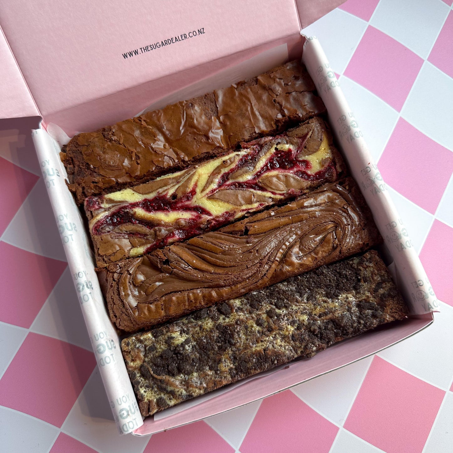 the classic brownie comes with four different brownie flavours - there's chocolate, oreo cheesecake, raspberry cheesecake and nutella!