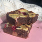 Rich and fudgy raspberry cheesecake brownie made with quality chocolate